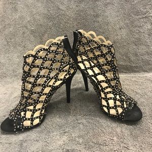 Brand new Zigisoho cut out high heel, zipper back